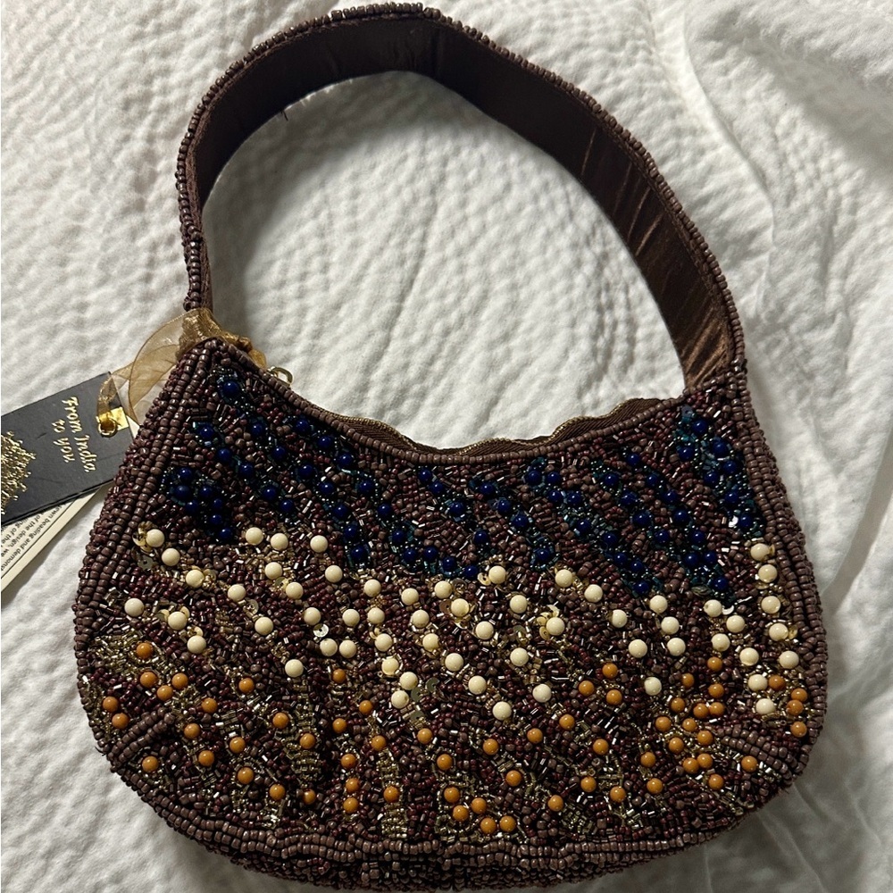From India to you brown beaded half moon shoulder bag